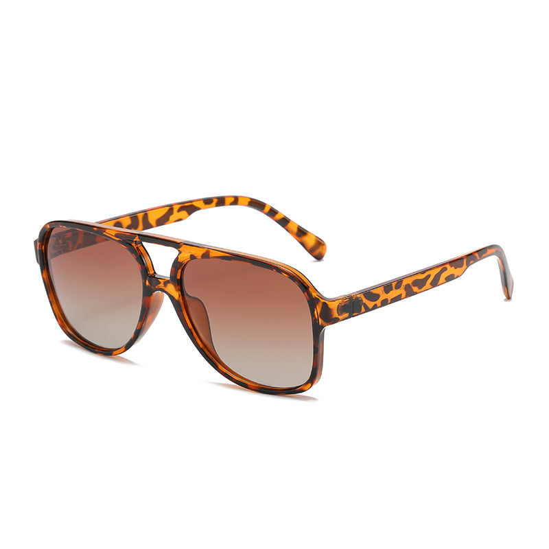 Polarized sunglasses with tortoise frame and brown tinted lenses