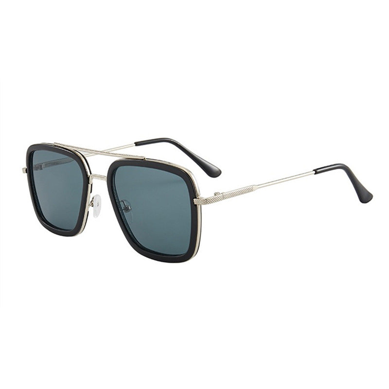 Square frame sunglasses with black frame, gold accents, and teal blue lenses