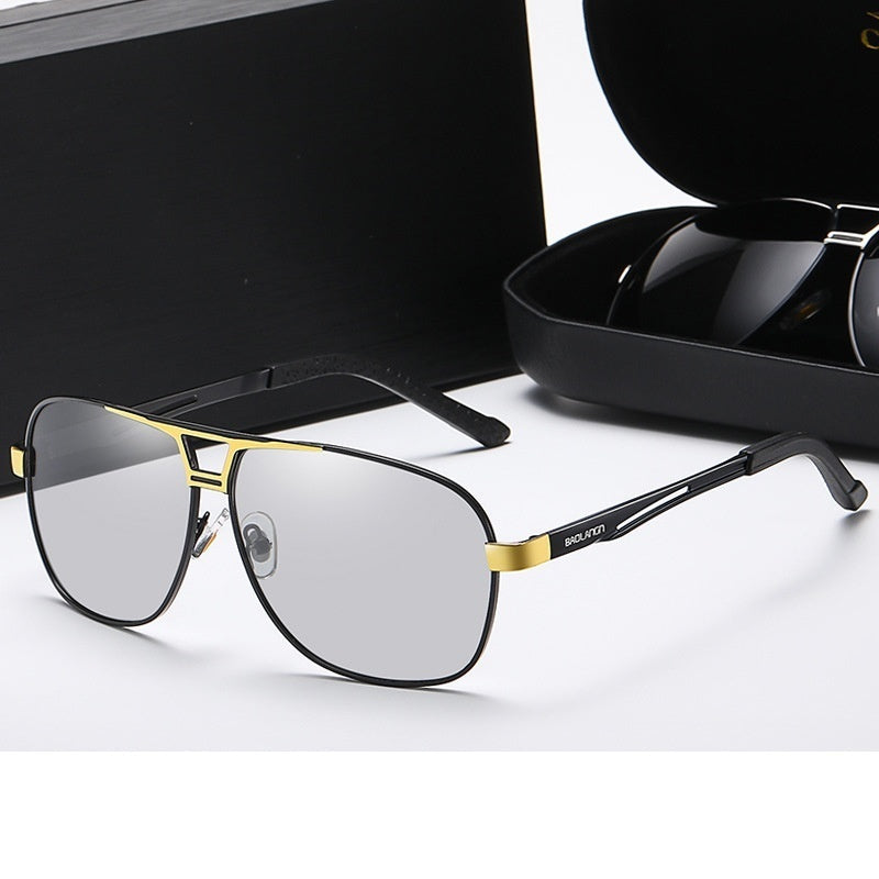 Polarized sunglasses with gray lenses and gold frame, black temple detail