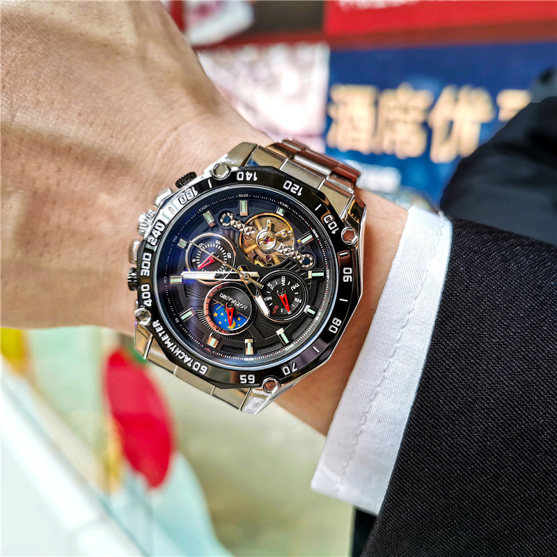 Men's automatic mechanical watch with gold-tone case and black dial on wrist