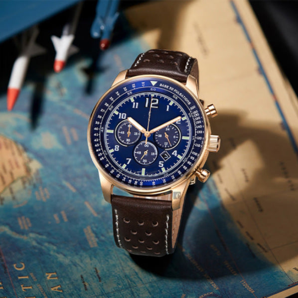 Blue-dial quartz watch with a rose-gold-tone case and brown strap displayed on a map