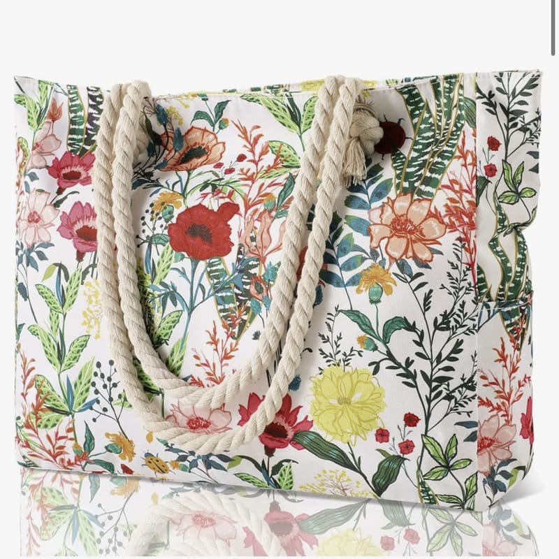 Printed polyester shoulder bag with floral pattern, braided rope handles, open top