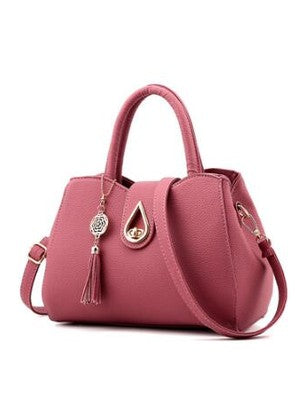 Purple PU leather women's handbag with top handles, shoulder strap, tassel key charm