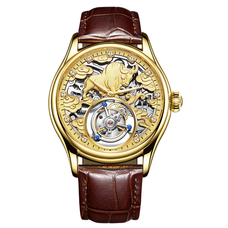 Gold-tone manual mechanical watch with brown leather strap and openwork tourbillon dial