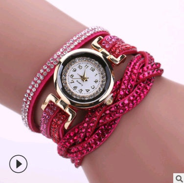 Ladies quartz watch bracelet with fuchsia leather strap and rhinestone trim