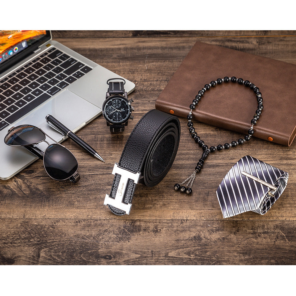 Men's six-piece gift set with watch, black belt, sunglasses, beaded necklace, and striped tie.