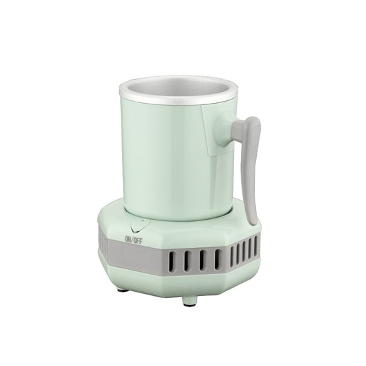Mint green electric coffee grinder on a white background