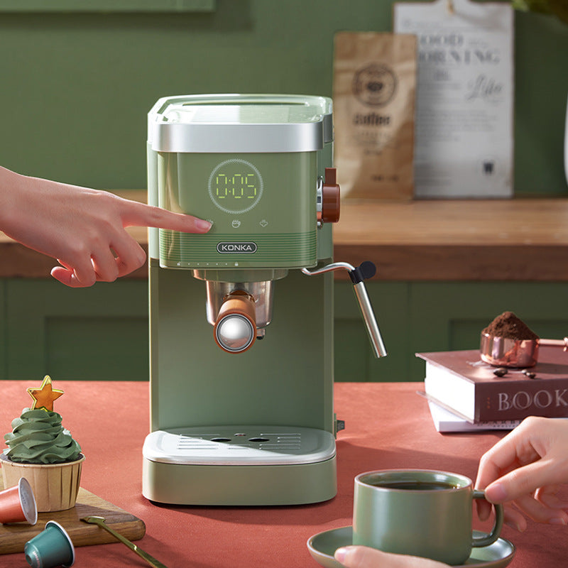 Green countertop insulated coffee maker with hand-ready brew spout and side control panel
