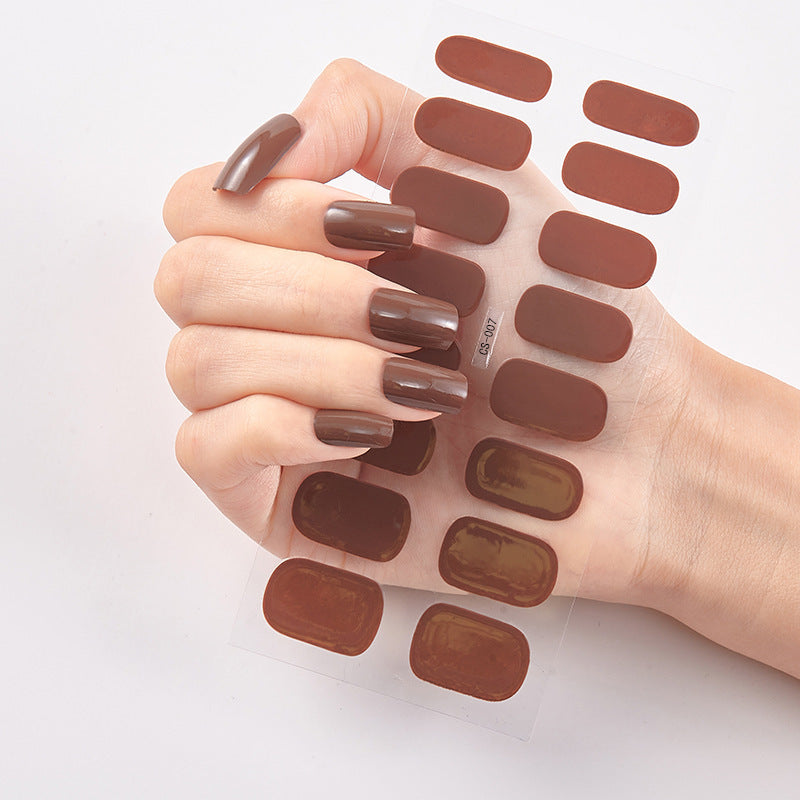 Nail sticker wraps on clear sheet with brown solid nail decals