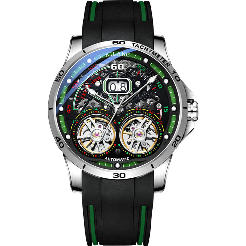 Automatic mechanical wristwatch, silver case with green accents, black rubber strap.