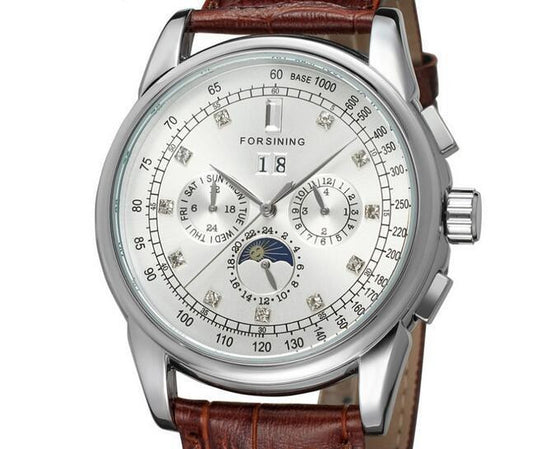 Watch with a detailed face and brown leather strap on a white background