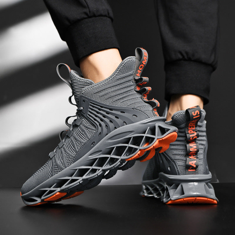 Grey sports sneakers with orange accents, mesh upper and TPU lattice sole, lace-up.