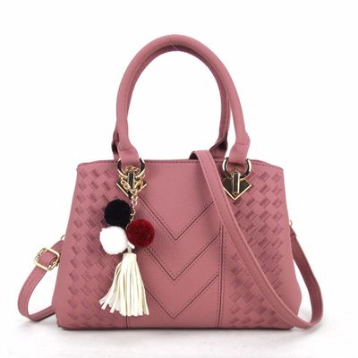 Women's crossbody handbag, rose pink PU leather with textured pattern and pom tassel charm