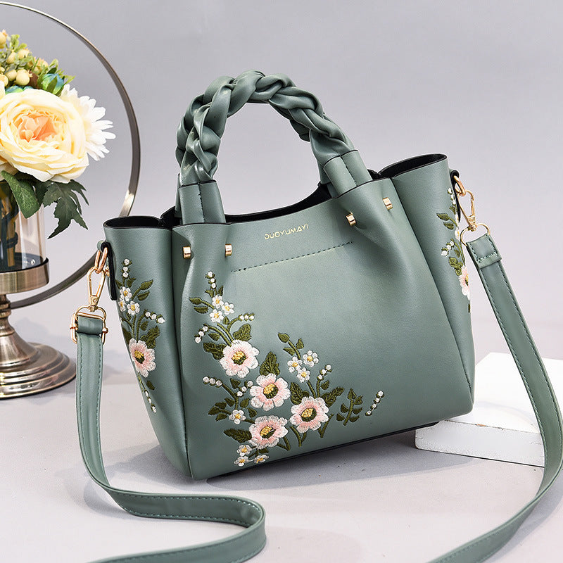 Floral PU handbag tote in sage green with braided handles and crossbody strap