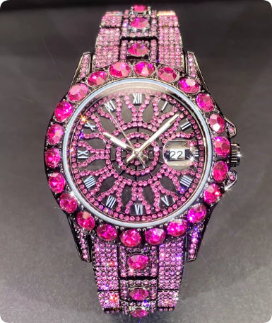 Diamond-encrusted wristwatch with pink bezel stones, pink dial, and crystal strap