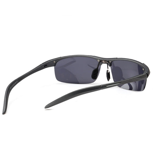 Black sunglasses with dark lenses on a white background