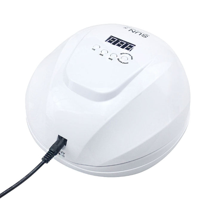White nail lamp dryer with control panel and attached power cable