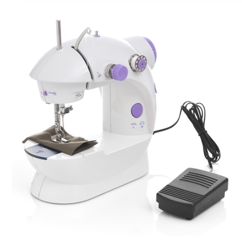Mini sewing machine with needle, presser foot, and included power cord