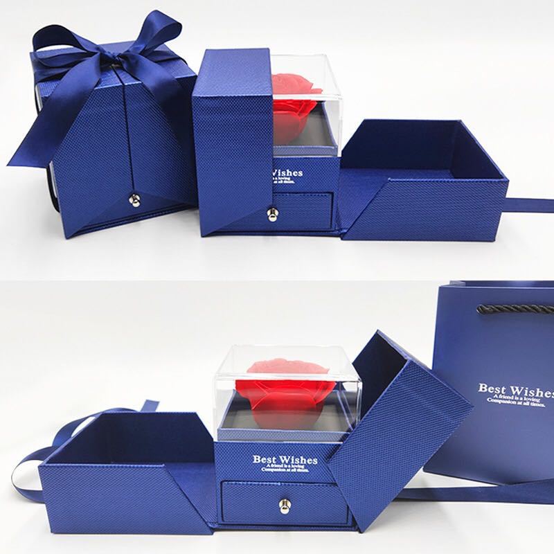 Blue rose jewelry gift box with clear rose compartment, folding trays, drawer, and ribbon-tied lid