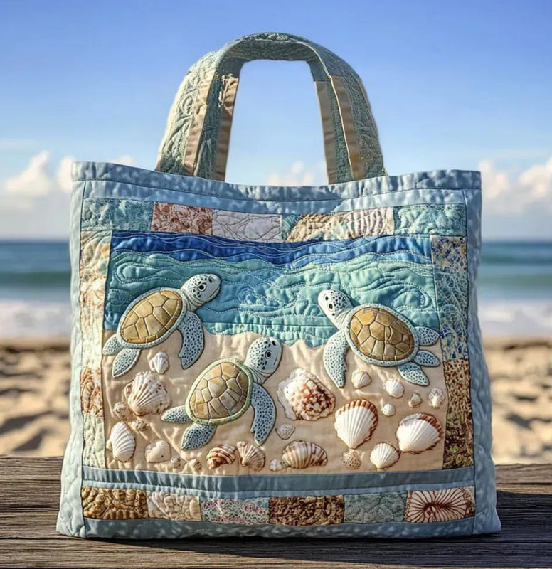 Patchwork printed tote bag with sea turtles and seashells on blue and cream panels