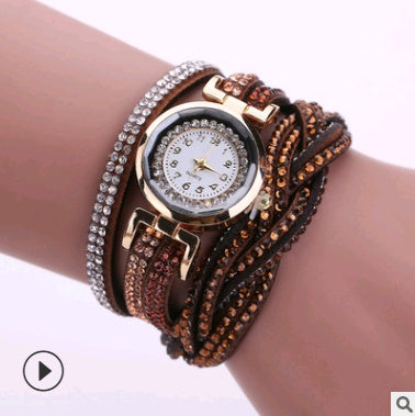 Ladies quartz watch bracelet with brown leather strap and copper-tone bezel