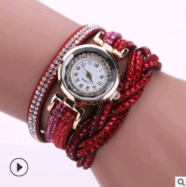 Ladies quartz watch bracelet with deep red leather strap and gold-tone clasp