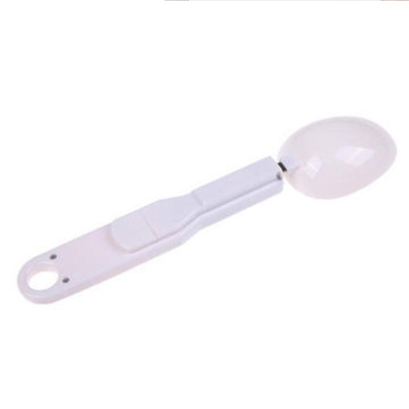 White digital kitchen scale spoon with round weighing cup