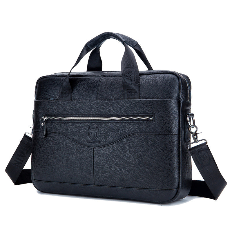 Black leather briefcase with top handles, front zip pocket, and adjustable shoulder strap