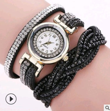 Ladies quartz watch bracelet with black leather strap and silver rhinestone accents