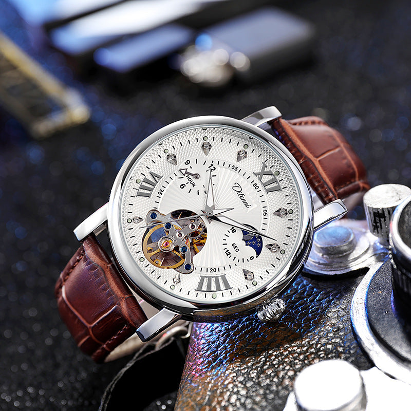 Mechanical watch with white dial, silver case, brown leather strap; open gearwork visible