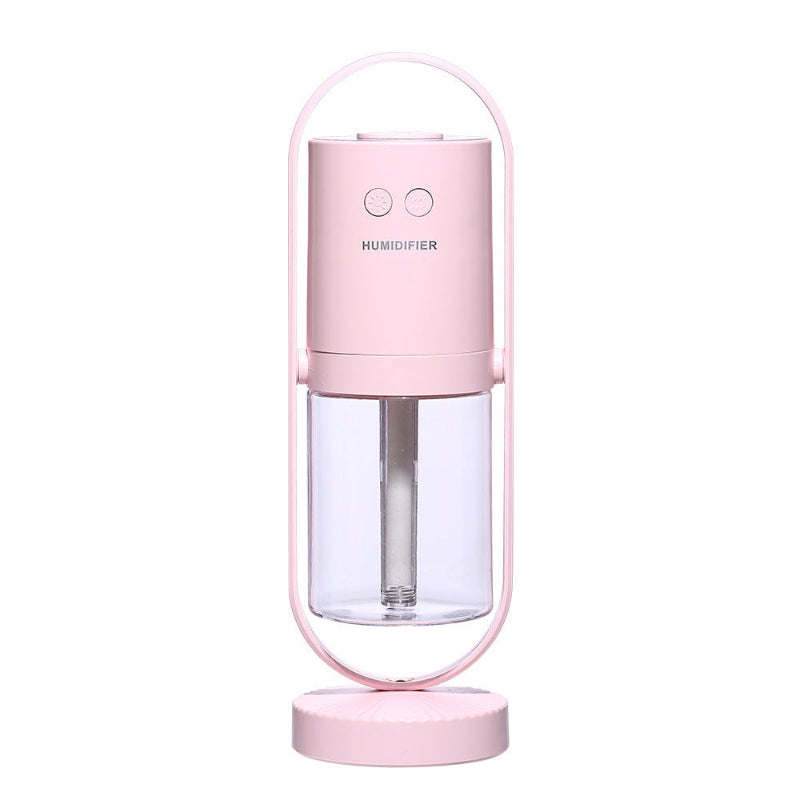 Pink USB ultrasonic air humidifier with mist chamber and night-light base