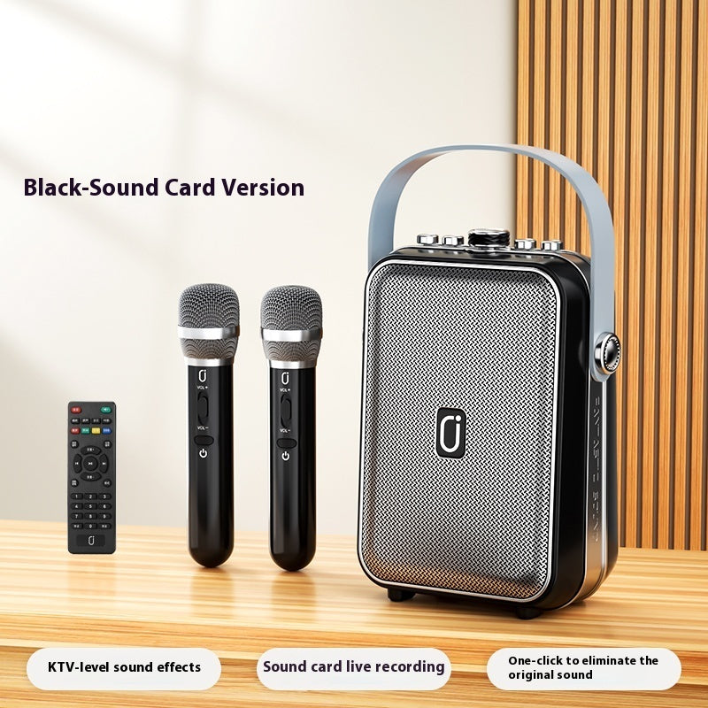 Black karaoke Bluetooth speaker with two matching handheld microphones