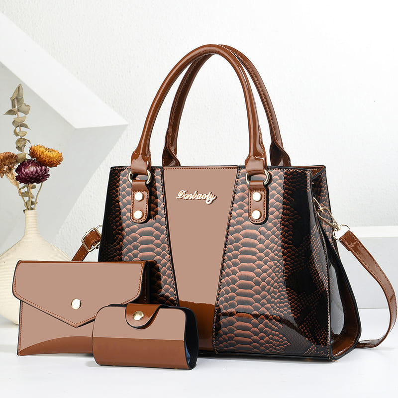 Black and tan large shoulder tote bag with top handles and matching wallet set