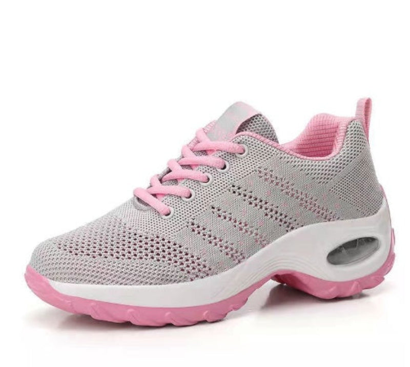 Light grey knit walking sneakers with pink laces and pink cushioned outsole