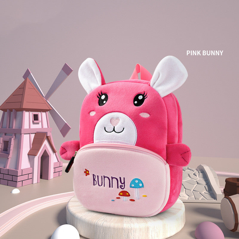 Plush small school bag with pink bunny face, white front panel and zip pocket