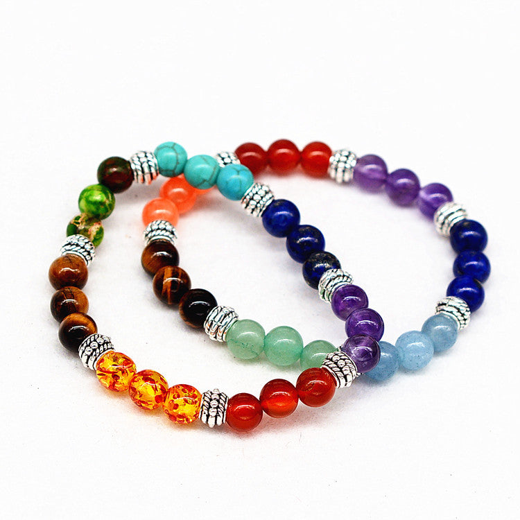 Seven chakra bead bracelet with blue, purple, red, green beads and tiger eye brown beads