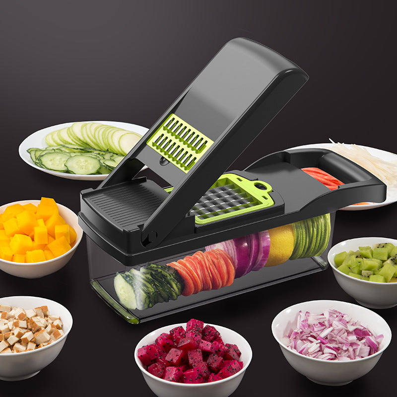 Black vegetable cutter with green grating insert and ridged slicing blade