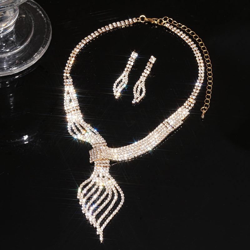 Silver-tone rhinestone choker necklace with matching drop earrings set