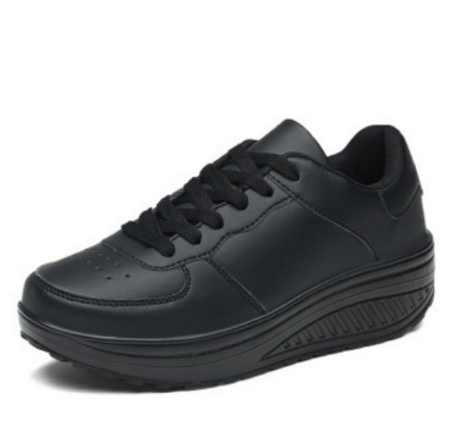 Women's woven sport shoes, black smooth upper, lace-up, ridged white midsole design.