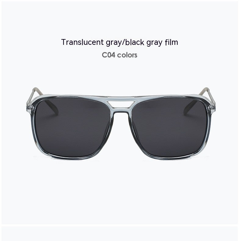 Gray/black polarized sunglasses with dark lenses and translucent frame