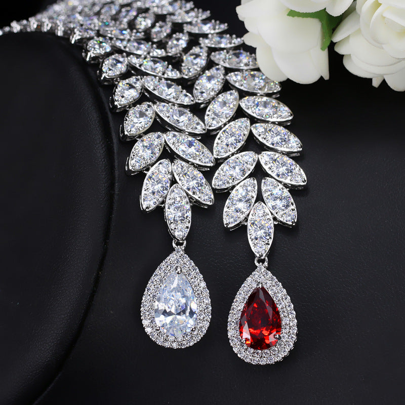 Two-piece AAA zircon set: crystal teardrop earrings with blue and red stones