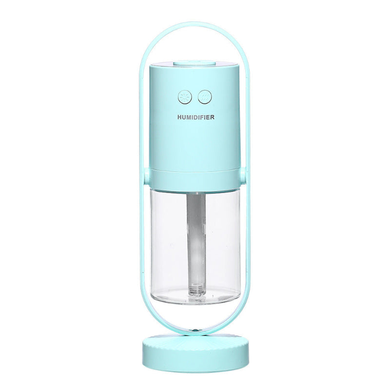 Light blue USB humidifier with curved handle, clear chamber, and LED base ring