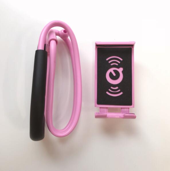 360-degree rotatable selfie phone holder with pink arms and wireless charging cradle