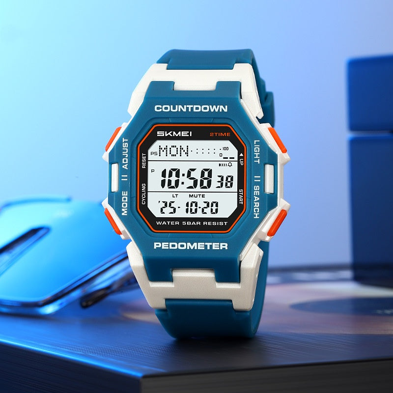 Blue-and-white SKMEI digital sports watch with orange buttons and a rectangular display on a blue background