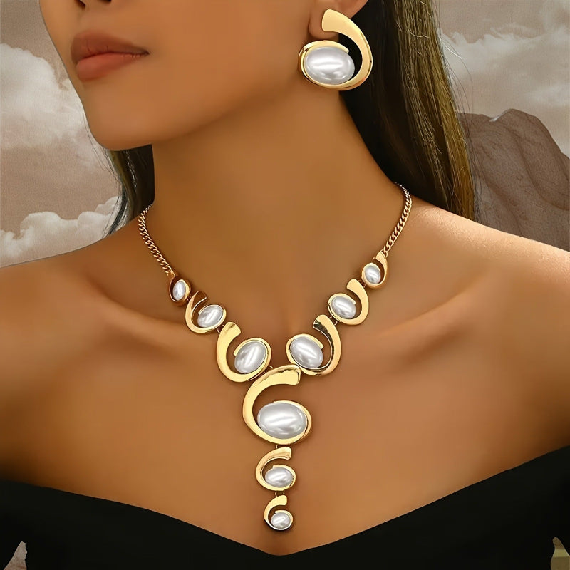Gold necklace with pearl-like stones worn by a model against a neutral background