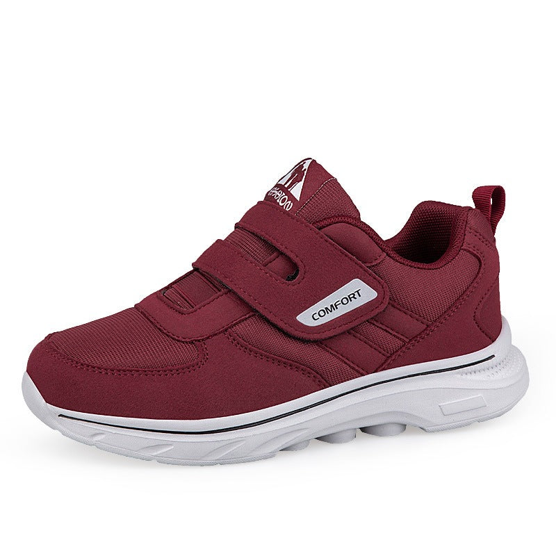 Purplish red lightweight casual sneakers with hook-and-loop straps and white outsole