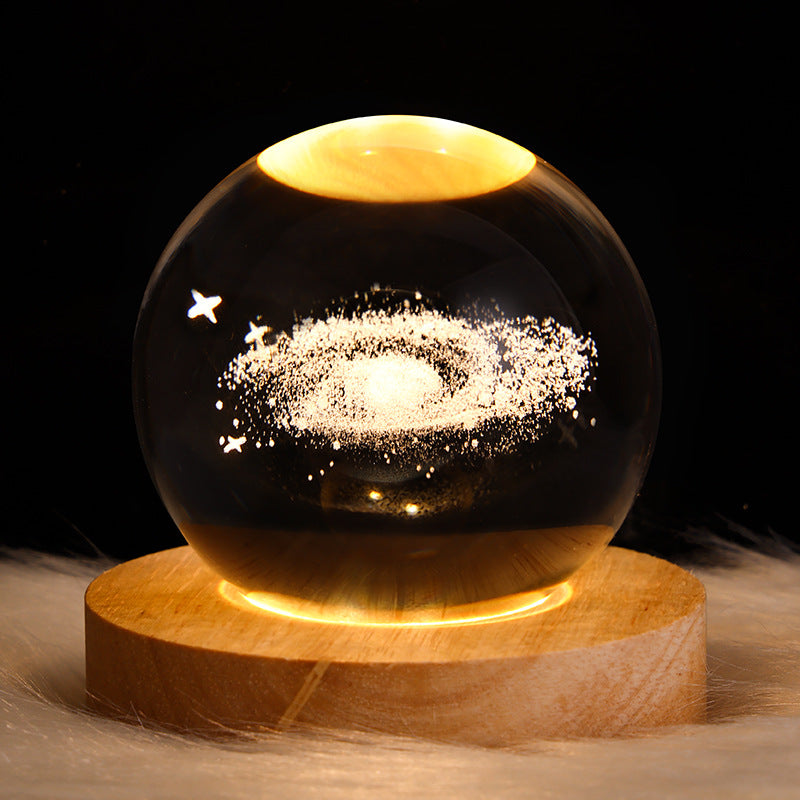 LED crystal ball night lamp with starry nebula sparkle light design on wooden base