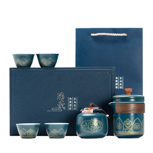 Tea set with blue containers and matching cups on a white background
