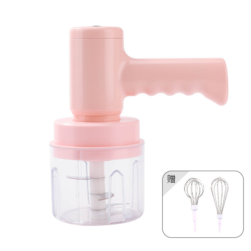 Electric whisk hand blender set in pink with clear mixing cup and wire whisk attachments