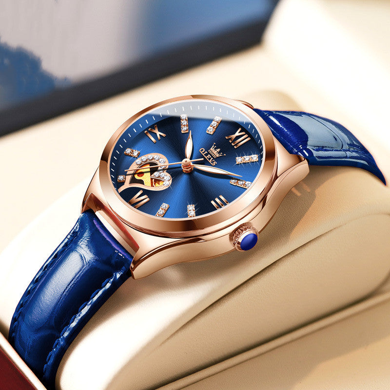 Rose gold automatic mechanical watch with blue leather strap, blue crystal dial